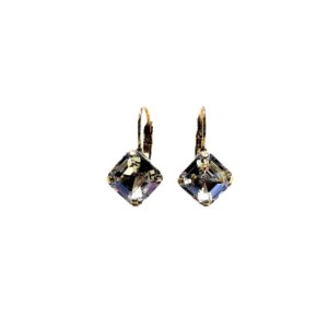 A pair of earrings with a diamond shaped stone.