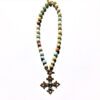 A necklace with a cross on it