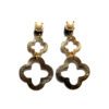 A pair of gold earrings with four leaf clover design.