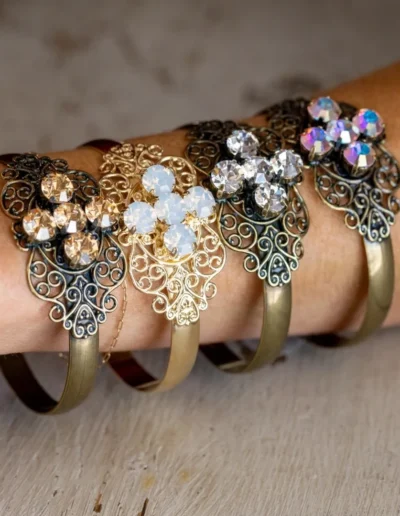 Ornate bracelets with sparkling gemstone designs.
