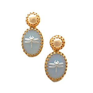 A pair of earrings with pearls and blue stones.