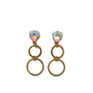 A pair of earrings with two rings and one is made from gold.