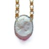 Gold chain necklace with cameo pendant.