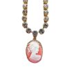 Gold necklace with pink cameo pendant.