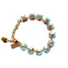 Colorful gemstone bracelet with gold chain.