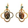 Gold earrings with decorative vintage medallions.