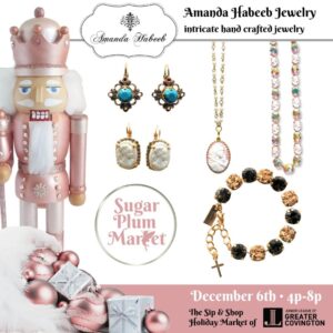 Pink nutcracker beside pastel handcrafted jewelry